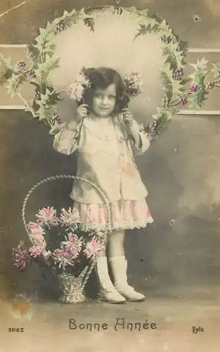 Elegant beautiful young girl wearing white dress with flower basket Bonne Anne greetings
