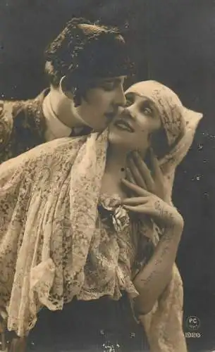 Elegant charming couple gallant courting sweet kiss on the cheek