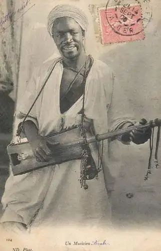 Typical african musician ethnic joy instrument 1908