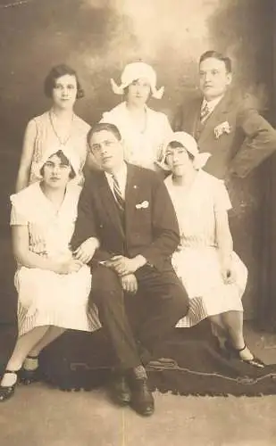 Real photo elegant gentlemen and ladies wearing traditional costumes 1923 group picture