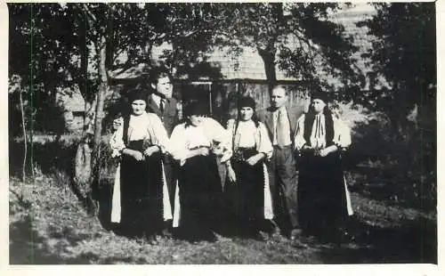 Real photo social history elegant gentlemen and women wearing traditional costumes