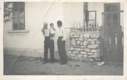 Real photo young child with father and grandfather