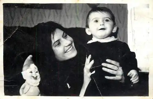 Real photo mother playing with her young boy