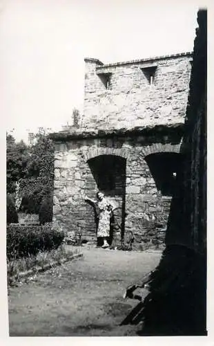 Real photo social history elegant woman in building