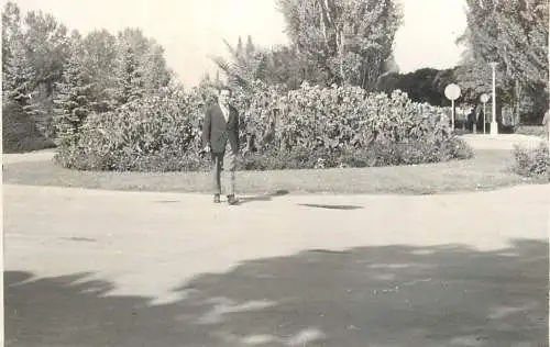 Real photo social history elegant man in garden