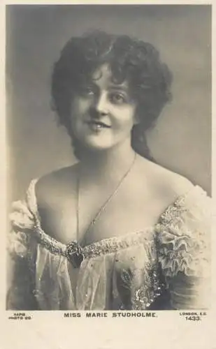 English actress and singer of the Victorian and Edwardian eras Miss Marie Studholme coiffure dress smile locket