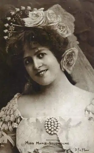 English actress and singer of the Victorian and Edwardian eras Miss Marie Studholme pearls coiffure dress smile