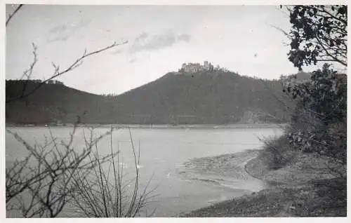 Real photo postcard scenic with castle place to identify