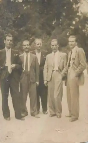 Postcard family social history group of elegant men