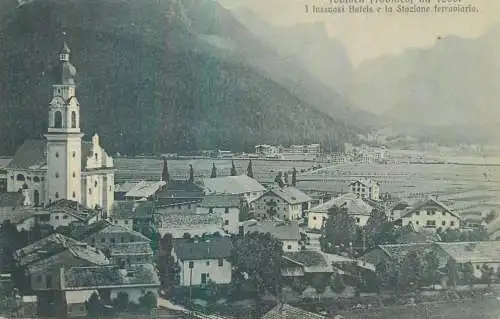 Italy Belluno province place to identify cityscape panorama with luxurious hotels and railway station