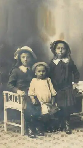 Children types young girls and little brother in Germany Darmstadt