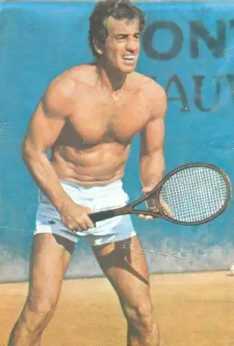 Actor Jean Paul Belmondo playing tennis