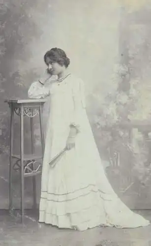 Portrait of a young lady 1900s fashion dress mode studio photo postcard