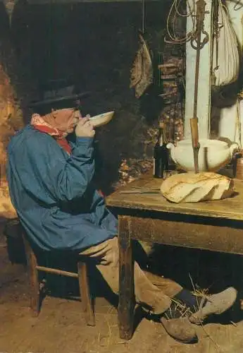 France En Perigord faire chabrot man finishing a bowl of soup