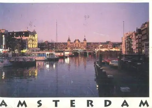 Netherlands Amsterdam Central Station river view evening aspect