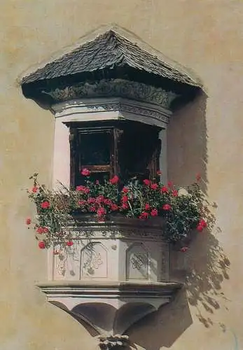 Switzerland Engadiner Erker flower decorated house balcony detail view