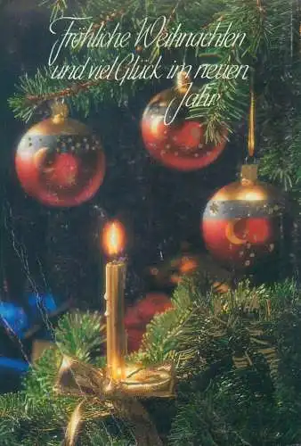 Winter Holidays greetings globes lit candles decorative ornaments fir tree detail aspect