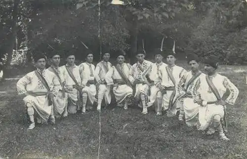 Social history types ethnic men wearing folk costumes group photo
