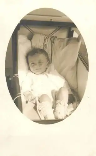 Social History smiling little baby in stroller