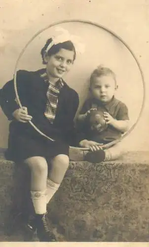 Social History children types and scenes sister playing with little brother