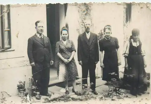 Social History elegant men and women family group photo