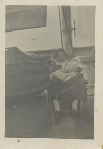 Photo ca. 6 x 9 cm mother & baby on a ship deck instant photography