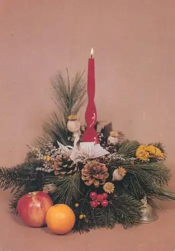 Christmas Holiday greetings lit candle apples decorative arrangement