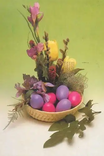 Happy Easter Holidays greetings painted eggs basket floral decorative arrangement