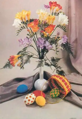 Easter greetings colourful floral arrangement pencilled eggs