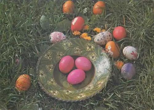 Easter greetings painted eggs on plate detail view