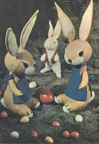 Easter greetings miniature toy world rabbits painted eggs hunt