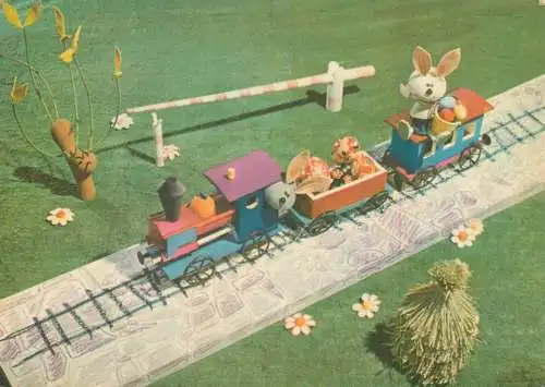 Easter greetings miniature toy world freight train painted eggs rabbit