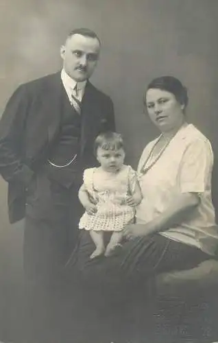 Vintage atelier studio photography anonymous people parents with little girl family portrait photo