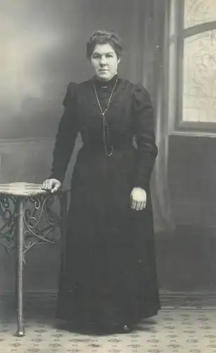 Vintage atelier studio photography anonymous person black dress woman portrait photo