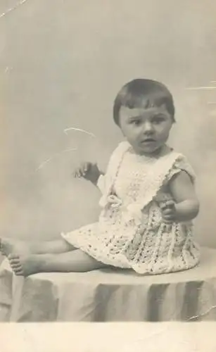 Vintage studio photography atelier anonymous person portrait confused funny face little girl social history photo