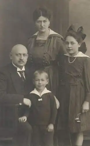 Vintage studio photography photographers anonymous people social history parents and children family group photo