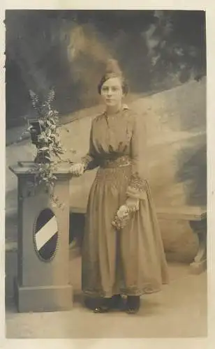 Vintage studio photography atelier photographers anonymous person woman elegant costume real photo portrait