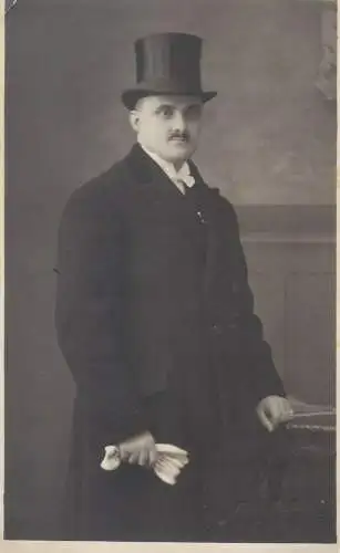 Vintage studio photography atelier photographers anonymous person gentleman elegant costume top hat real photo portrait