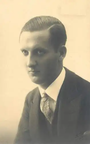Vintage studio photography atelier photographers elegant gentleman anonymous person portrait 1930 photo