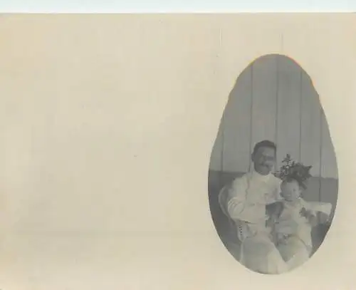 Postcard father with little baby
