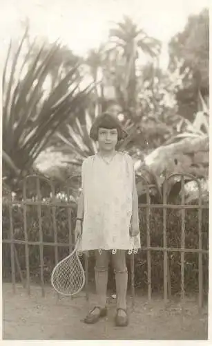 Children portraits & scene vintage photography 1932 girl playing tennis