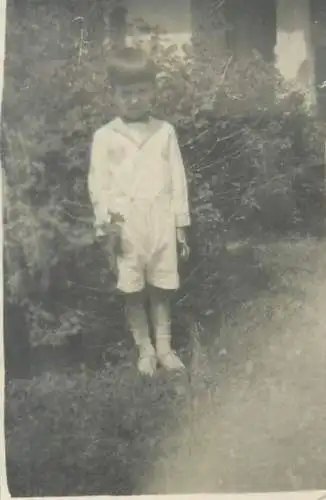 Photo ca. 6 x 9 cm social history boy outside