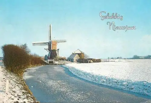 Postcard Netherland winter scenery and wind mill New Year