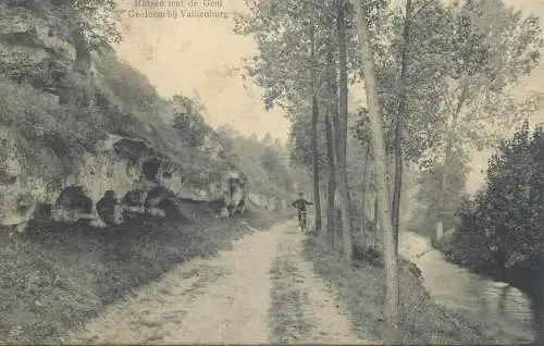 Postcard Netherlands Valkenburg Geulhelm man riding bicycle