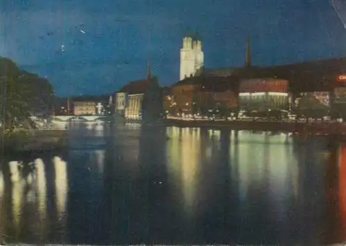 Postcard Switzerland Zurich Blick von der Quaibrucke gegen Bauschanzli und Grossmunster bei Nacht