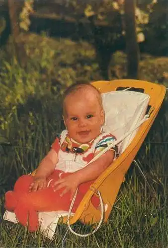 Postcard children types laughing toddler in baby chair outdoor