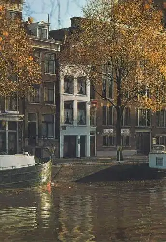 Netherlands Postcard Singel with smallest house of Amsterdam (no. 7)