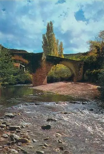 Post card place to identify autumn day old stone bridge