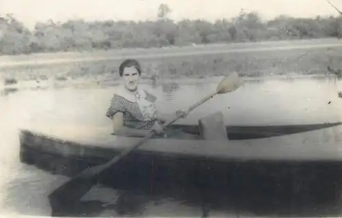 1934 Postcard social history woman in rowing boat on lake instant snapshot real photo