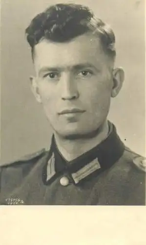 Postcard soldier officer in uniform real photo